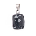 Close-up of a square natural stone pendant with black and white spotted patterns - Snowflake Obsidian