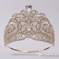 Macro detail of the golden bridal crown featuring teardrop crystal and rhinestone motifs - Gold/Full White Zirconia