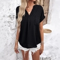 Women's V-neck short sleeve black blouse with polka dot texture and chest pockets - S / Black
