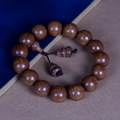 Deep brown 18mm liudaomu wood prayer beads bracelet with gourd-shaped tassel bead - Premium Old Wood 15mm*15 Beads (Gourd Accessory)