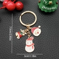 Golden Christmas keychain with Santa Claus, snowman, and bell enamel charms on black leather - ER820-Enamel Christmas Snowman Bell Santa Head Keychain