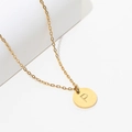 Gold plated stainless steel necklace with round pendant featuring letter P and pearl detail - Gold P