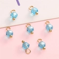 Blue faceted glass bead charms with gold metal caps for DIY jewelry making - Lake Blue Round Bead