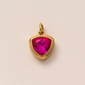 Detail of 18k gold plated triangle pendant featuring a faceted rose red birthstone - July Birthstone Pendant (Ruby)