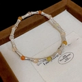 Bambus-Silberarmband mit orangefarbenen und rosa Kristallperlen in einer Geschenkbox - Bambus Gelenk Perlenarmband