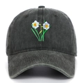 Close-up of daffodil floral embroidery on washed black cotton vintage baseball cap - Army Green