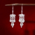 Detailed close-up of vintage silver ethnic earrings with delicate flower tassel design - Hollow Bud Waterdrop Tassel Style (E2439-2/Silver)