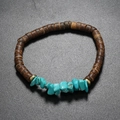 Bracciale elastico bohémien con perline di cocco scure e pietre turchesi naturali blu - Turchese