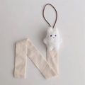 Close-up of a white plush rabbit charm with beige herringbone ribbon and hanging loop - White 3D Rabbit