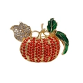 Sparkling pumpkin brooch with red rhinestones and green enamel on gold metal base - SG0105