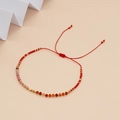 Handmade red cord bracelet with natural stones and gold beads in bohemian style - Mixed Red