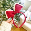 Detail of red velvet Christmas headband with white fur trim and sparkling finish - Bright Velvet Red Bow