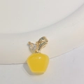 Detail view of yellow opal apple pendant with 18K gold plated leaf and sparkling crystal - Yellow