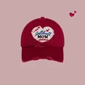 Distressed dark red baseball cap featuring Softball MOM heart embroidery and worn brim - Burgundy