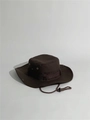 Detail view of brown boonie hat featuring metal ventilation holes and adjustable chin strap - One Size / Coffee
