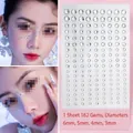 Face gem stickers with 162 transparent rhinestones in mixed 3mm to 6mm sizes - 126 Mixed Size Clear Rhinestones