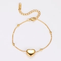 Minimalist gold heart charm bracelet with small round bead accents on a white background - Heart Bead Chain Bracelet / Gold (Bracelet)