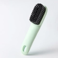 Long handle cleaning brush for shoes in mint green with dense black bristles - Long Handle Shoe Brush / Green