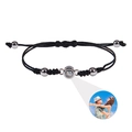 Dettaglio macro della pietra di proiezione foto su bracciale intrecciato nero con sfere in acciaio - Tondo - Argento