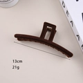 Dettaglio della molletta per capelli floccata marrone da 13 cm con trama morbida e metallo - Fermaglio a Barra Floccato 13cm Caffè Scuro