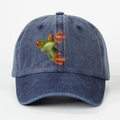 Detailed macro view of embroidered red-eyed tree frog on navy washed denim baseball cap - Navy Blue