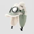 Detail der Kinderfliegermütze mit grünem Kord, Lammwollfutter und dekorativer Pilotenbrille - 3-6 Jahre / Grün