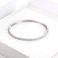 Silver stainless steel bangle with single row of clear zircon on a white stand - B036 Silver Full Zircon