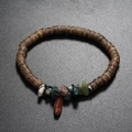 Bracciale bohémien in cocco con pietre naturali colorate su uno sfondo nero opaco - Agata muschiata