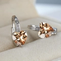 Elegant silver heart-shaped earrings featuring champagne zircon stones in a velvet box - Platinum Plated Champagne Zircon