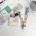 Detail of Capybara card holder set with blue lanyard and cute charm on newspaper background - Horizontal Card-Yellow Bathtub