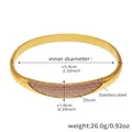 Detail view of 18k gold plated stainless steel bangle with pink zircon inlay and dimensions - Z420-Wide Style / Gold Pink Zirconia