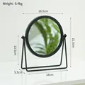 Minimalist round desktop makeup mirror with a black metal frame and U-shaped swivel stand - Bracket Style - Black