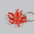 Portachiavi realistico a forma di polpo rosso in PVC con anello in metallo argento - Stile portachiavi