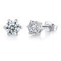 Macro view of six-prong setting detail and brilliant round cut zircon on silver earrings - Round 6-Prong / Platinum