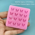 Detailed view of pink silicone mold with 16 butterfly cavities for DIY nail art and resin - Silicone / 16-Cavity Butterfly - Pink