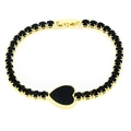 Dettaglio del bracciale tennis placcato oro con cuore nero e pietre rotonde - Nero