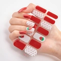 Adhesive strawberry and red polka dot nail art stickers shown on a model hand - DQ-10 Strawberry Polka Dot