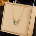 Golden butterfly necklace with iridescent mother-of-pearl inlay and cubic zirconia stones - Gold + Cross Chain - MOP Butterfly