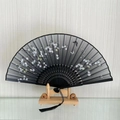 Classic black folding fan with white floral and butterfly patterns and black tassel - Spring Garden (Grey)