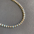 Handmade beaded necklace with gold spheres and translucent opal-style square stones - Style 1