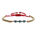 Macro shot of Hamsa Hand charms and red woven cord on an adjustable beaded bracelet - Hamsa Hand / Blue Enamel