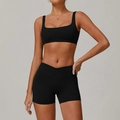 Women's black two-piece workout set with square neck sports bra and cross waist shorts - S / Tank Top + Shorts / Black