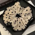 Oversized beige scrunchie with black polka dots and velvet texture for hair styling - Khaki Polka Dot