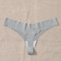 Seamless grey sports thong for women with high elasticity and cotton lining flat lay - Light Gray