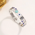 Brazalete vintage de acero inoxidable con ojo del diablo en esmalte y strass azul - Color Acero