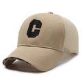 Khaki mesh trucker hat featuring a black letter C embroidery and Sport brim detail - Khaki