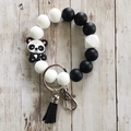 Silicone bead keychain bracelet with panda charm and black tassel in white and black - Panda
