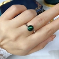 Minimalist ring featuring a deep green freshwater pearl on a silver bypass band - 7-8mm (Adjustable) / Black