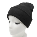 Detailed view of the thick knit texture and wide cuffed brim on a black winter beanie - Black (07)