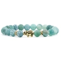 Green weathered agate bead bracelet featuring a golden elephant charm and rhinestone spacers - Green Weathered Stone